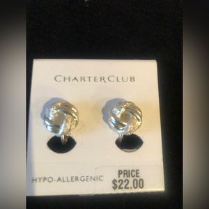 Silver love knot clip earrings